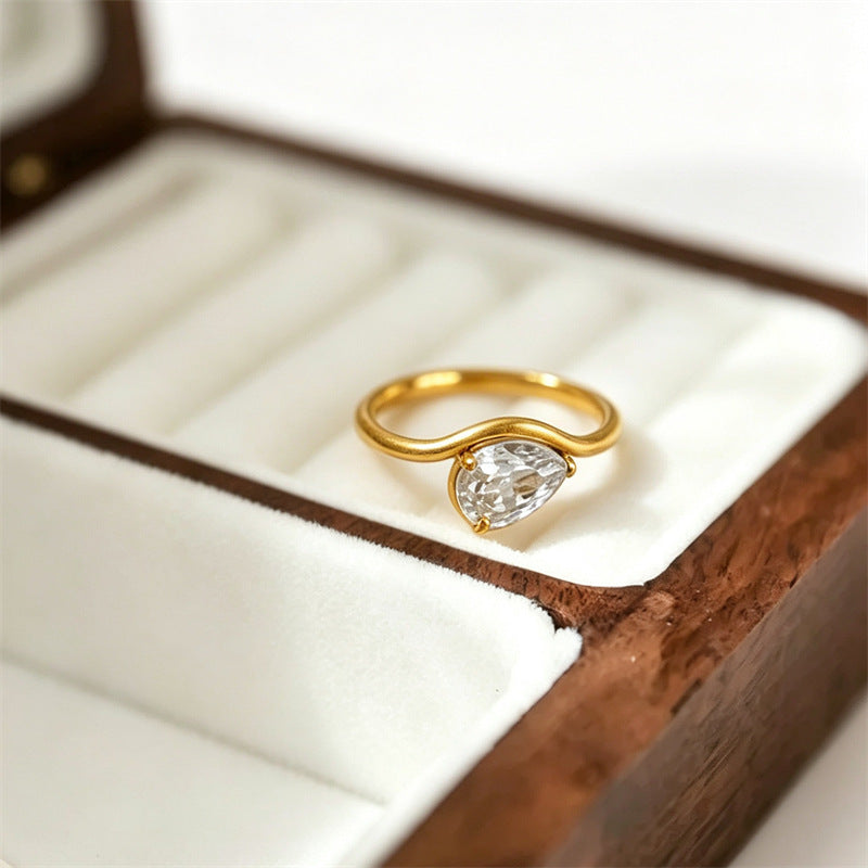 The Amora Pear Solitaire Ring