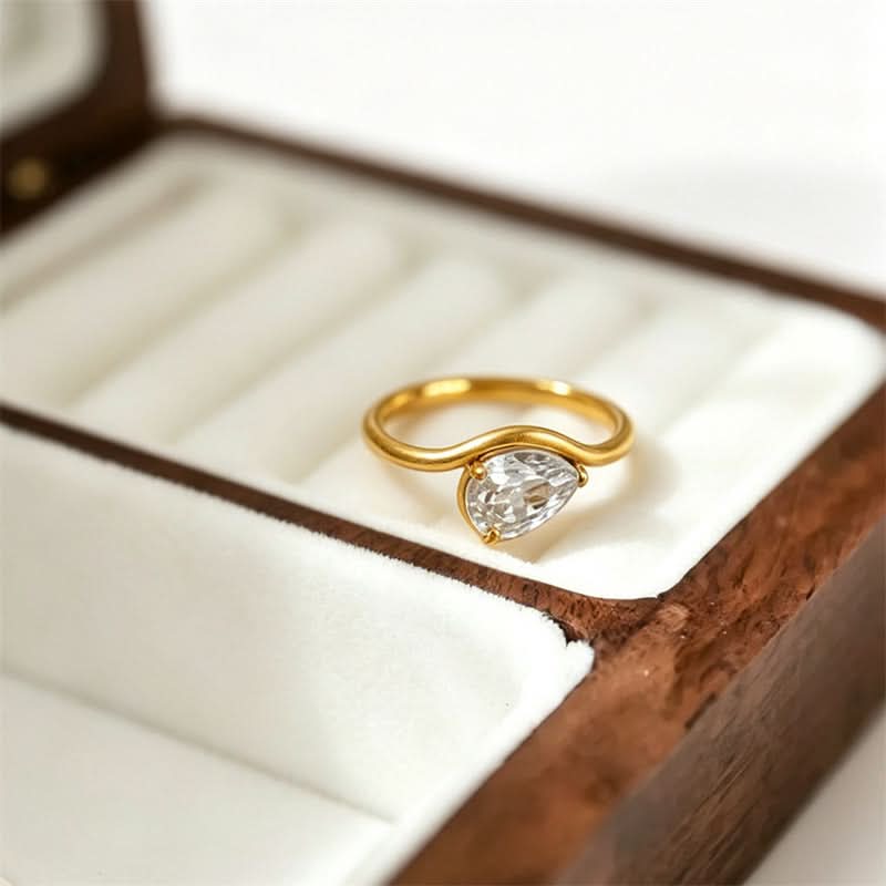 The Amora Pear Solitaire Ring