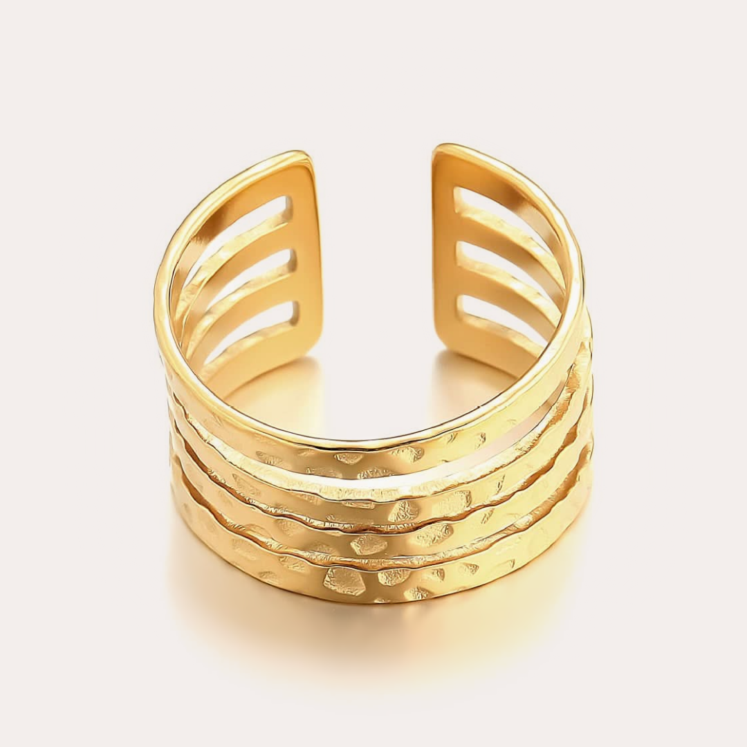 The Amora Hammered Row Band, gold stainless steel ring