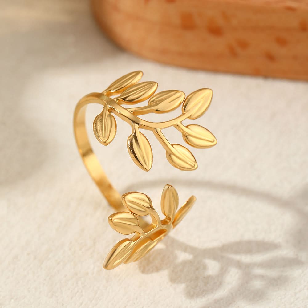 The Amora Olive Branch Ring worn on the hand