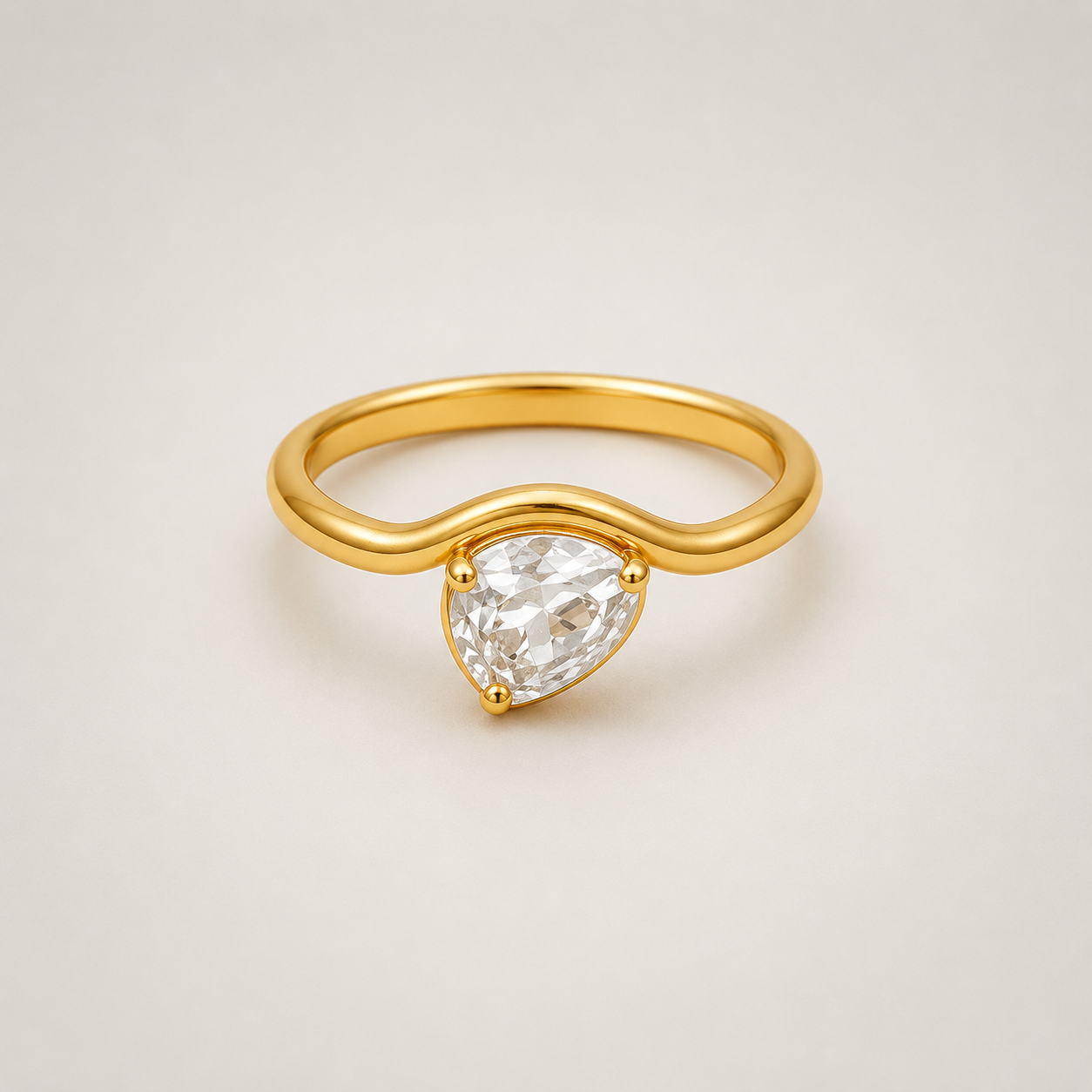 The Amora Pear Solitaire Ring