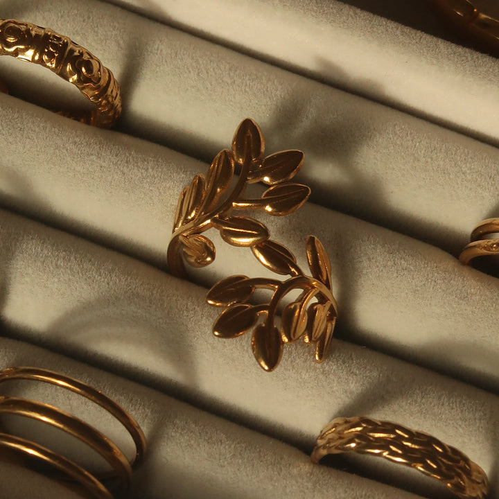 Earned ring in gold on a velvet tray