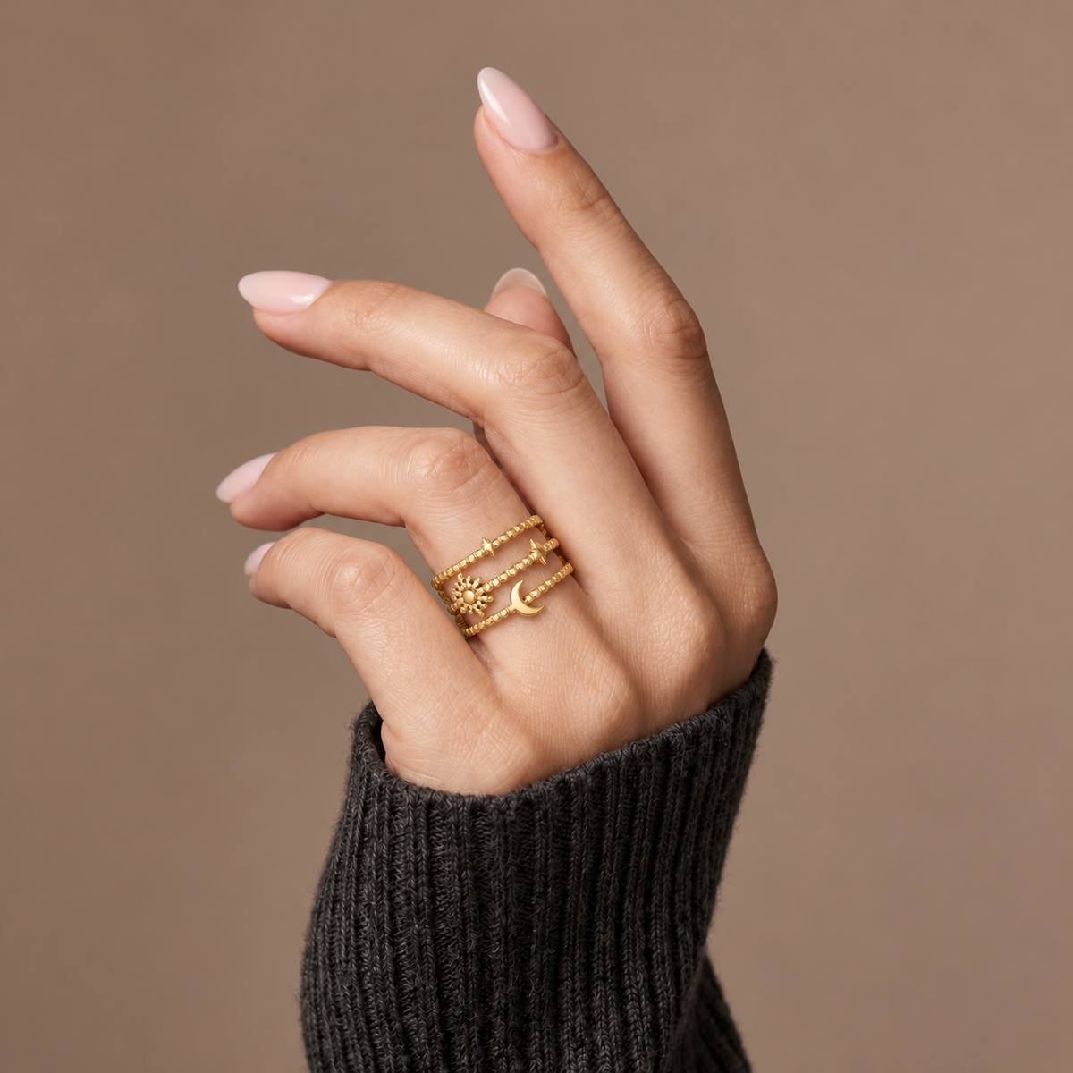 The Amora Celestial Trio Ring worn on the hand