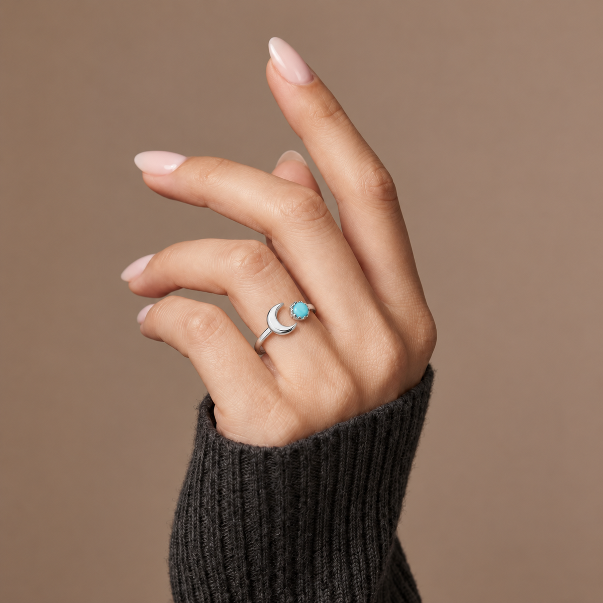 The Amora Crescent Wrap Ring in silver, worn on the hand #Color_Silver