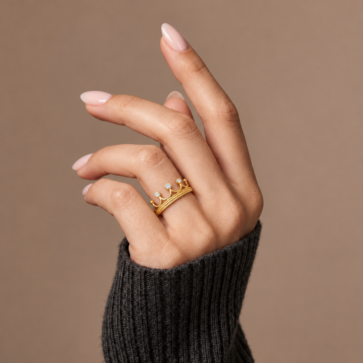 The Amora Crown Ring worn on the hand