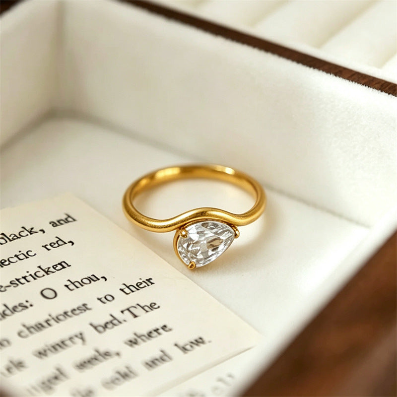 The Amora Pear Solitaire Ring