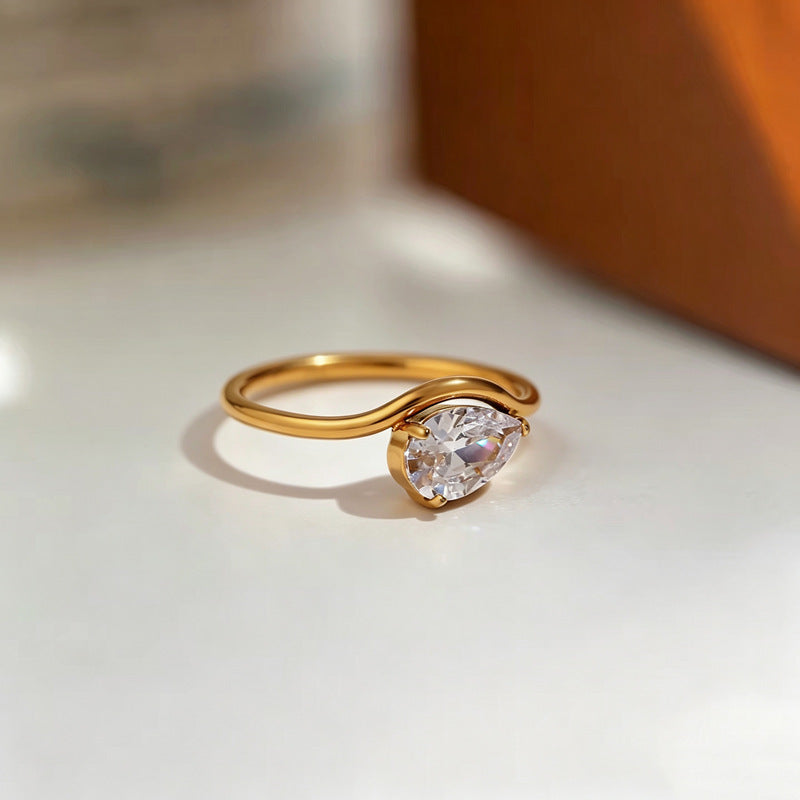 The Amora Pear Solitaire Ring