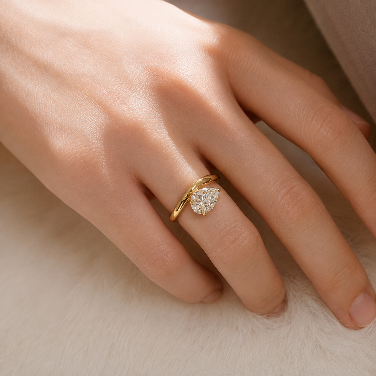 The Amora Pear Solitaire Ring