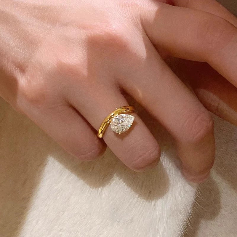 The Amora Pear Solitaire Ring