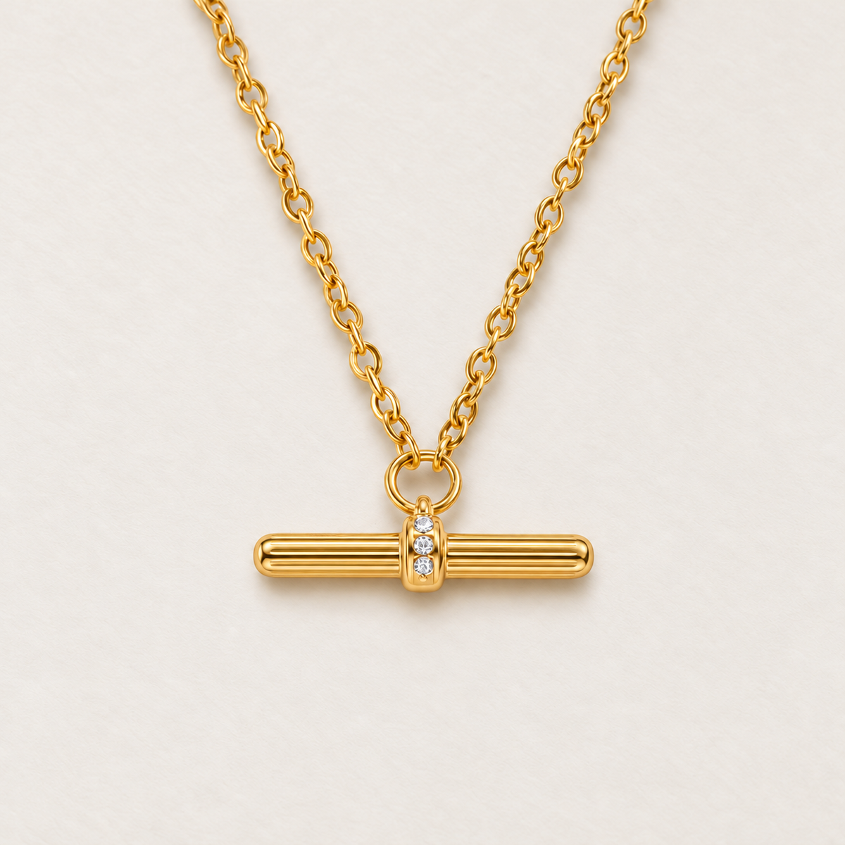 Albertina T-Bar Necklace in gold, Petite style: fine cable chain and a slim fluted T-bar with three small clear stones