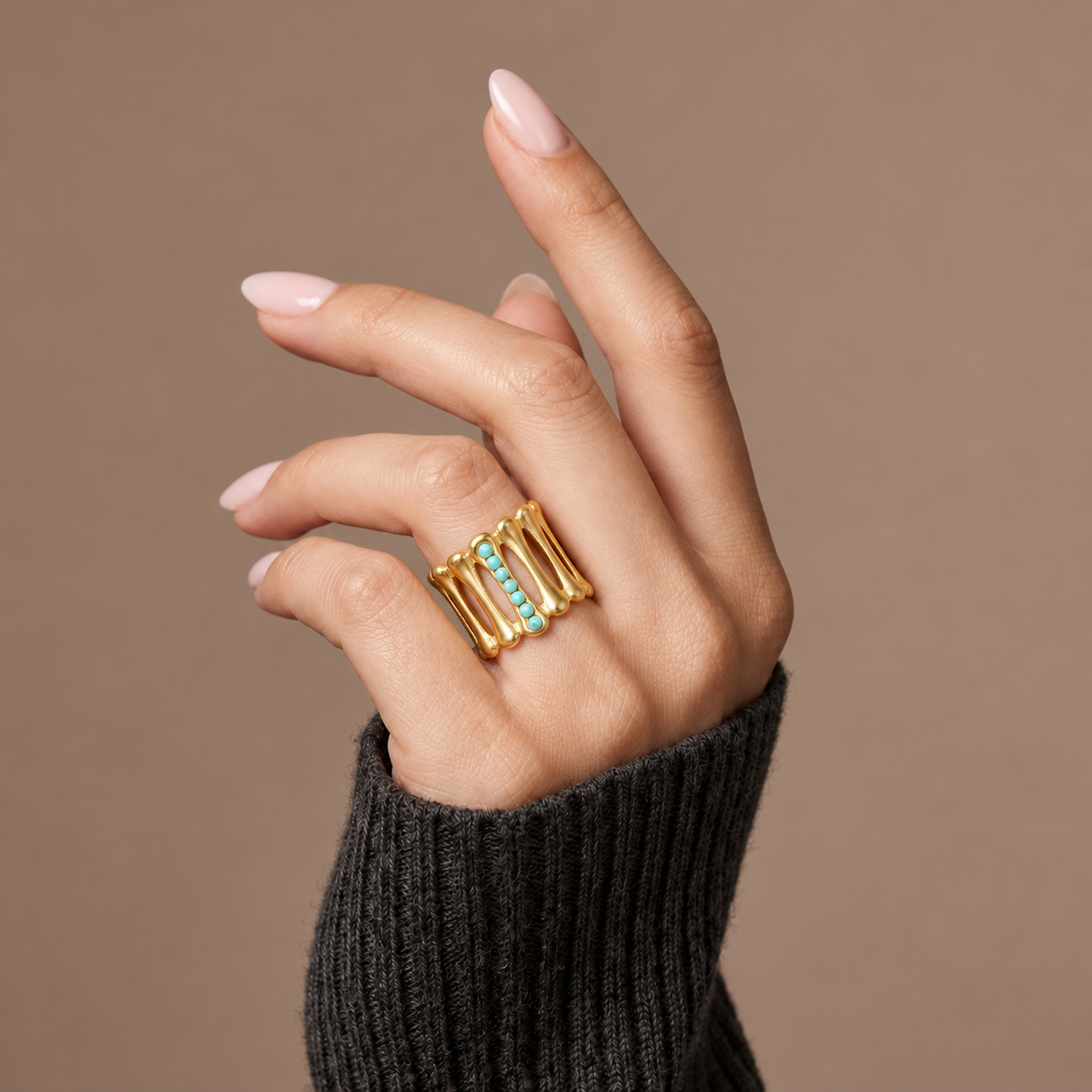 The Amora Bamboo Ring worn on the hand