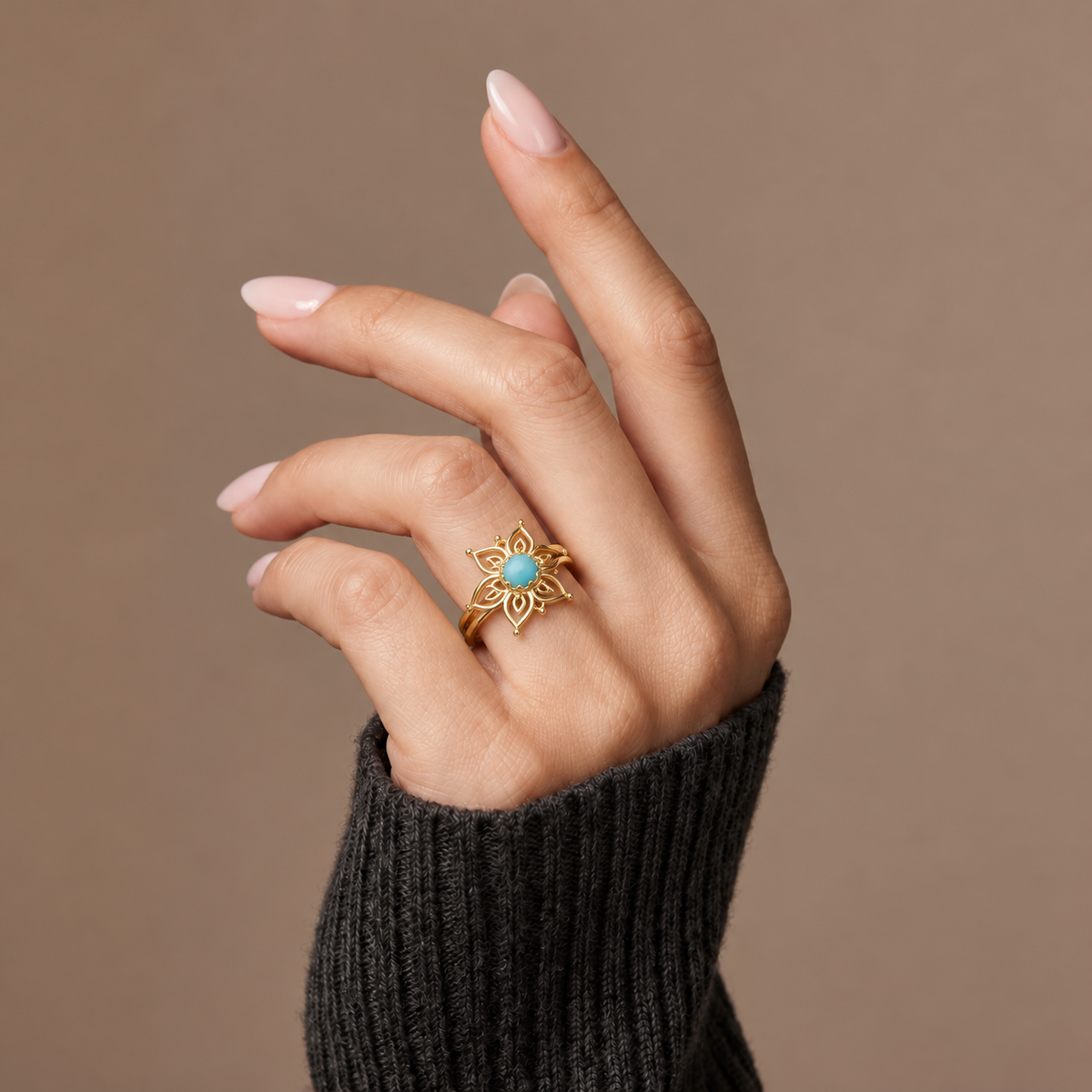 The Amora Mandala Bloom Ring in gold, worn on the hand #Color_Gold