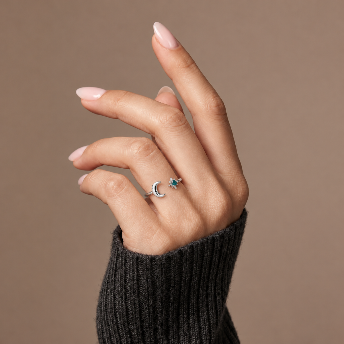 The Amora Moon & Star Ring in silver, worn on the hand #Color_Silver